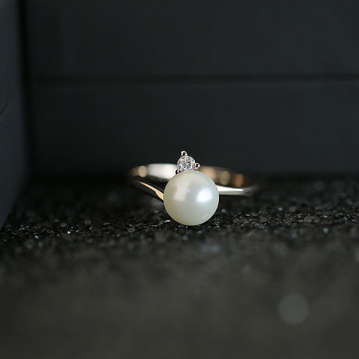 White gold-plated ring with colored zircon