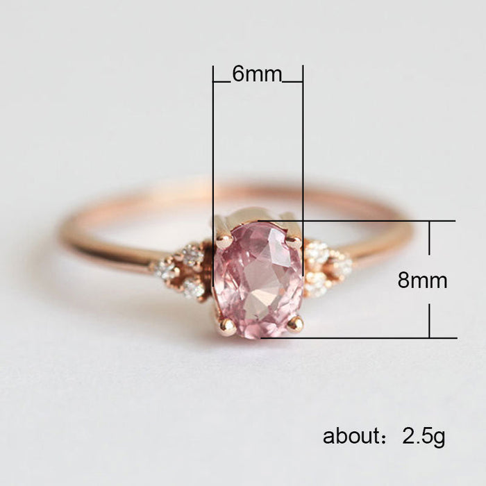 Anillo de compromiso ovalado con forma de princesa y circonita rosa