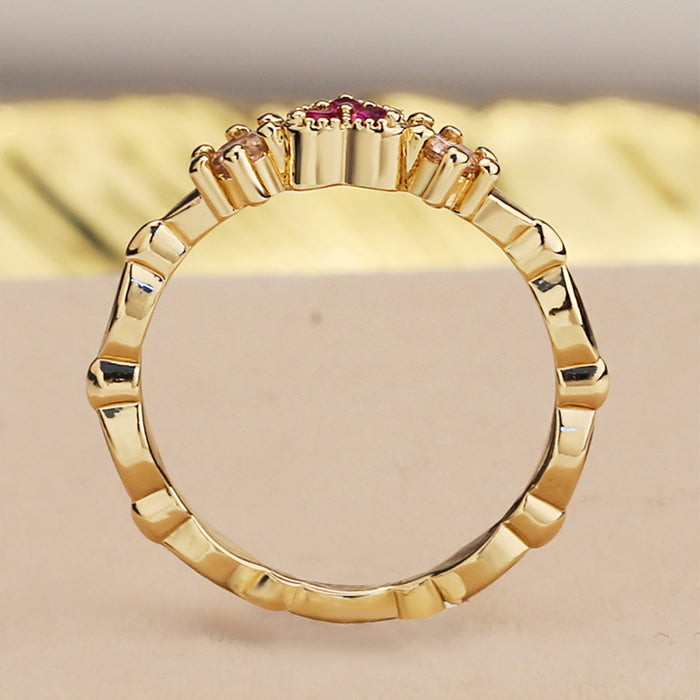 Anillo de estrella con circonitas bañado en oro rosa