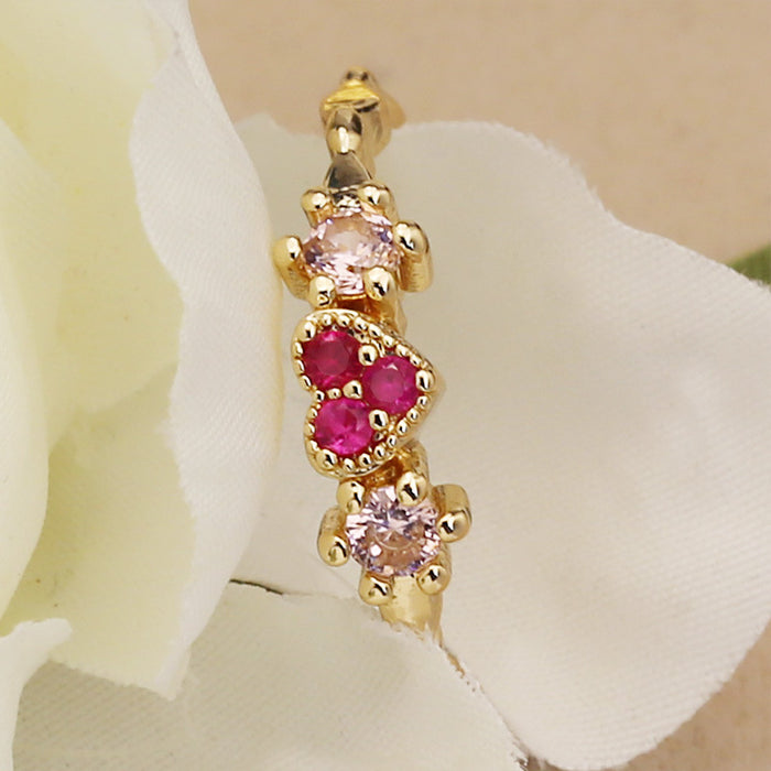 Anillo de estrella con circonitas bañado en oro rosa