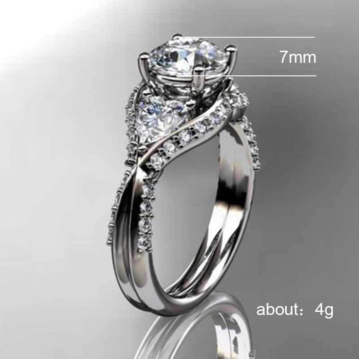 Gold-plated oval ring with colored zircon