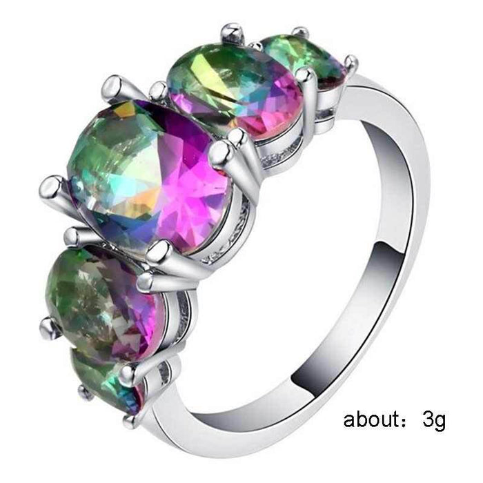 Anillo de diente de león de moda con circonitas de colores