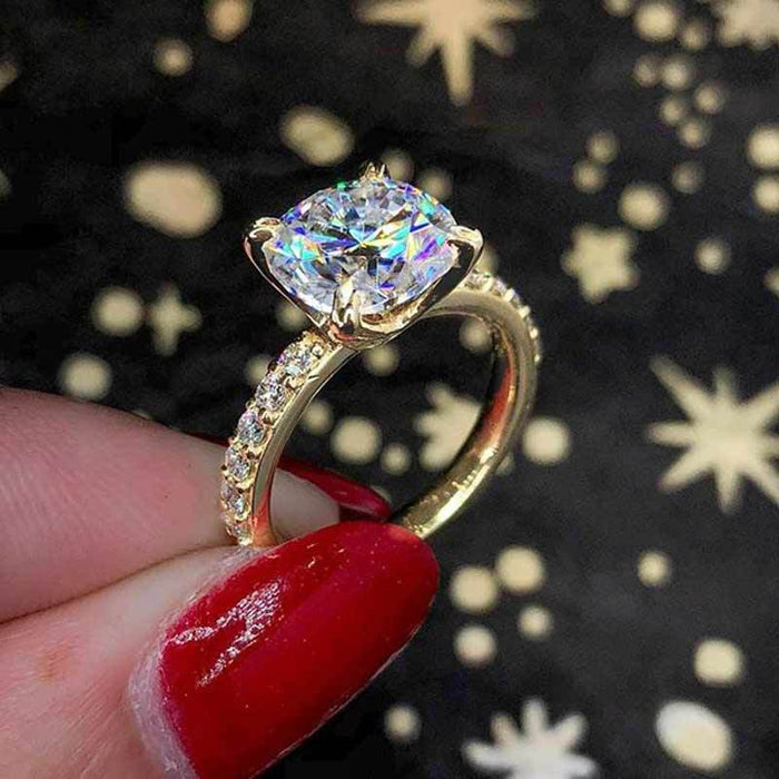 Anillo de mujer con circonitas de oro real bañado en cobre y redondo de cuatro garras