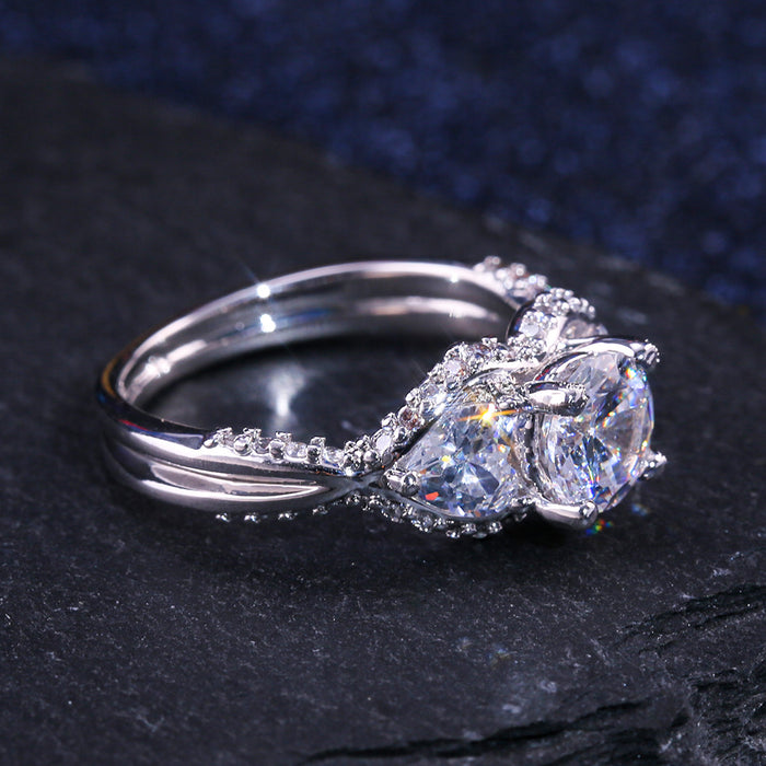 Gold-plated oval ring with colored zircon