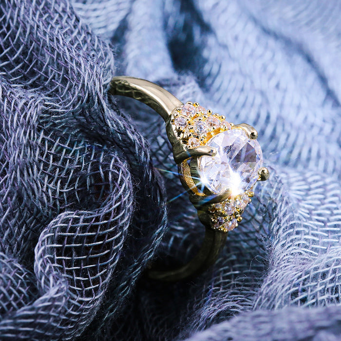 Anillo de mujer con circonitas bañadas en oro y cobre