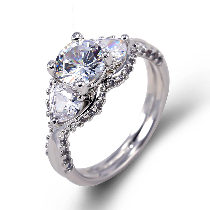 Gold-plated oval ring with colored zircon