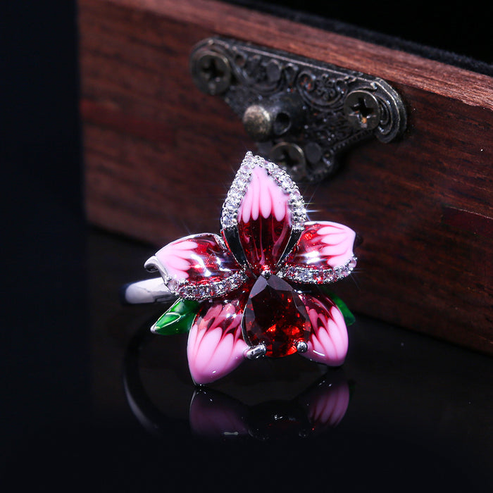 Anillo abierto con diamantes y circonitas en oro rosa para mujer