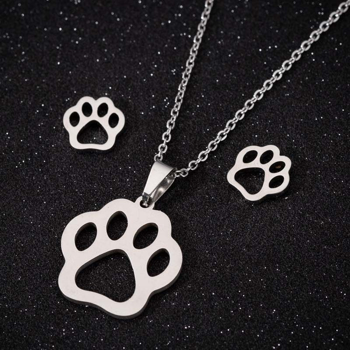 Bear paw print necklace set, European and American simple hollow earrings stainless steel hand jewelry three-piece set spot wholesale