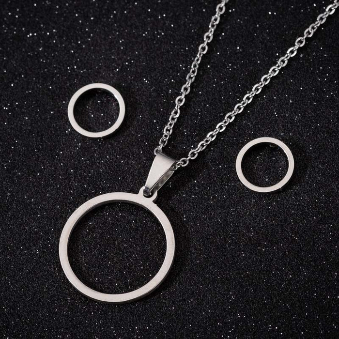 Round necklace earrings three-piece set, European and American stainless steel simple geometric hollow round pendant jewelry wholesale