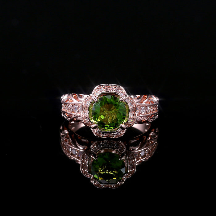 Anillo de flor de circonita verde con incrustaciones de cobre y oro rosa