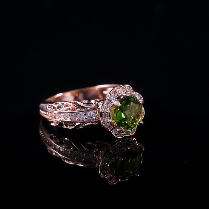 Anillo de flor de circonita verde con incrustaciones de cobre y oro rosa