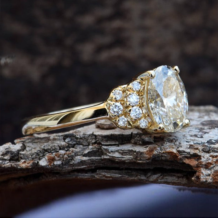 Anillo de mujer con circonitas bañadas en oro y cobre