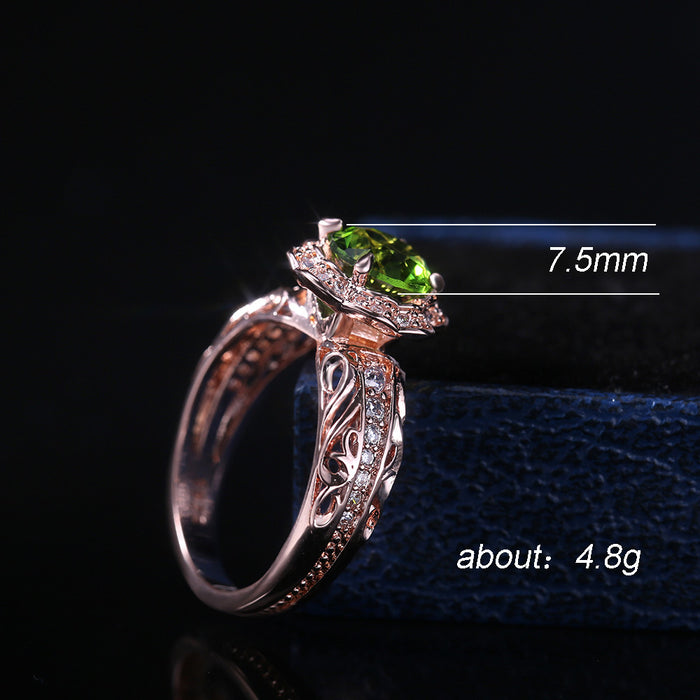 Anillo de flor de circonita verde con incrustaciones de cobre y oro rosa