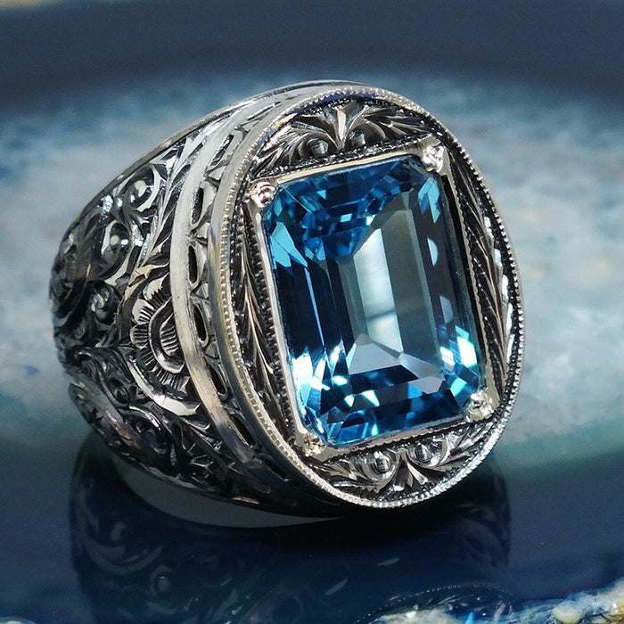 Vintage style carved hollow blue crystal zircon ring