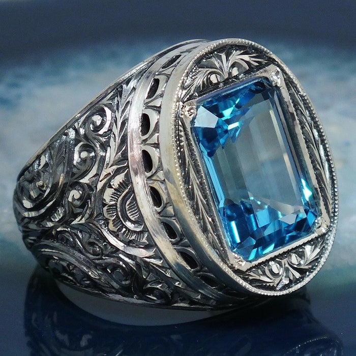 Vintage style carved hollow blue crystal zircon ring