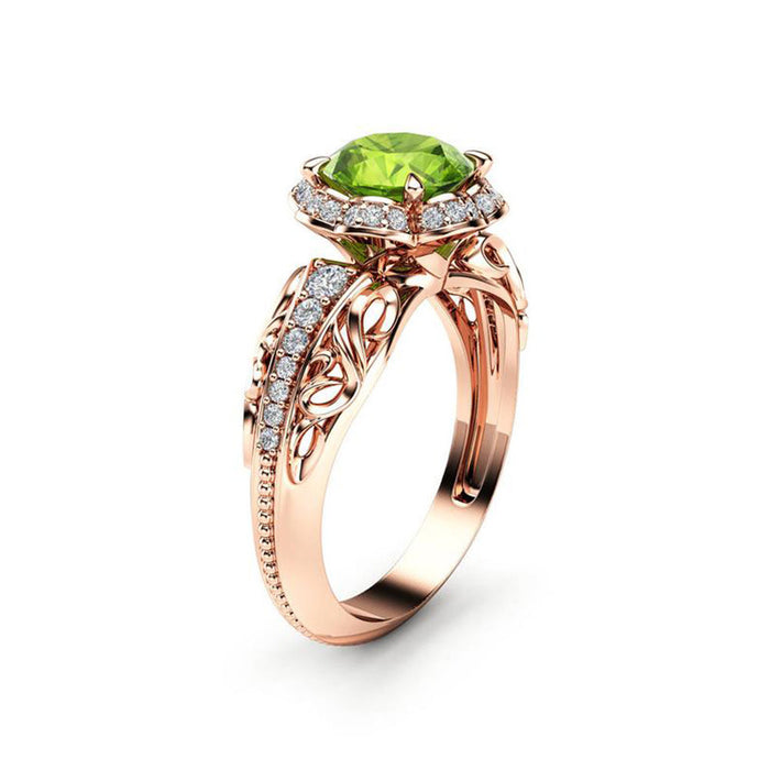 Anillo de flor de circonita verde con incrustaciones de cobre y oro rosa