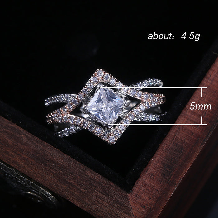 Diamond four-claw zircon ring