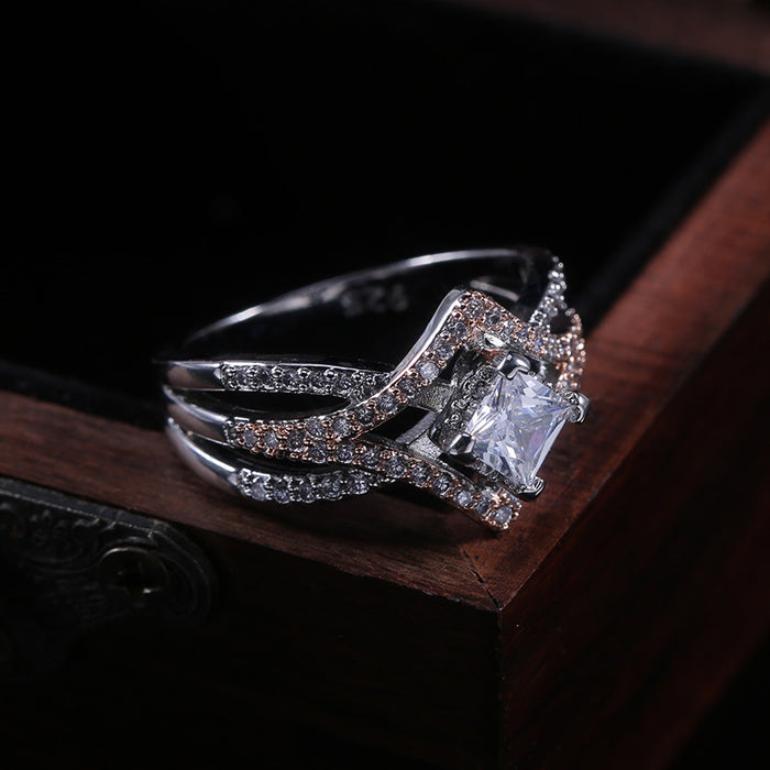 Diamond four-claw zircon ring