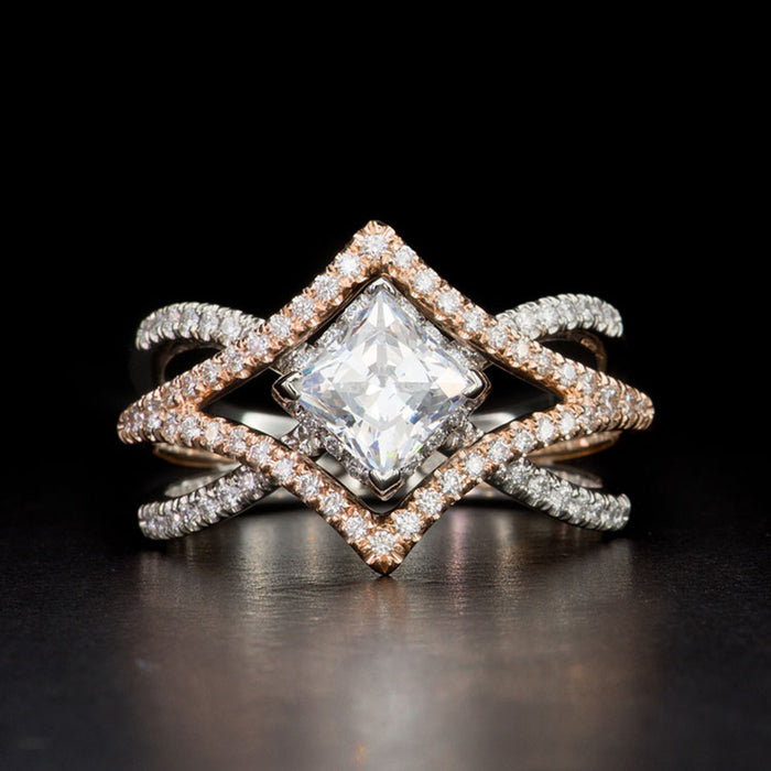 Diamond four-claw zircon ring