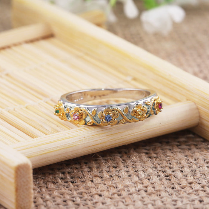 Diamond four-claw zircon ring