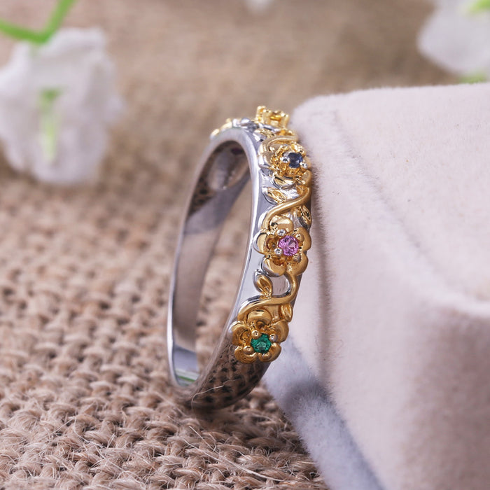 Diamond four-claw zircon ring