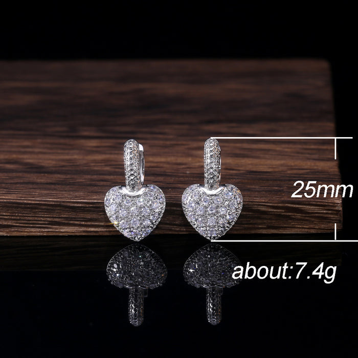 Pendientes de corazón de diamantes y circonitas Carat Lover del mismo estilo