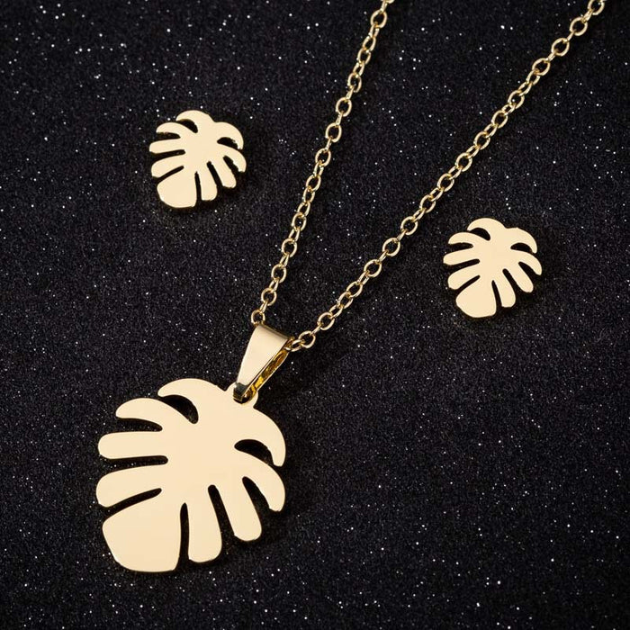 Christmas running deer snowflake feather hollow skull earrings necklace European and American wholesale