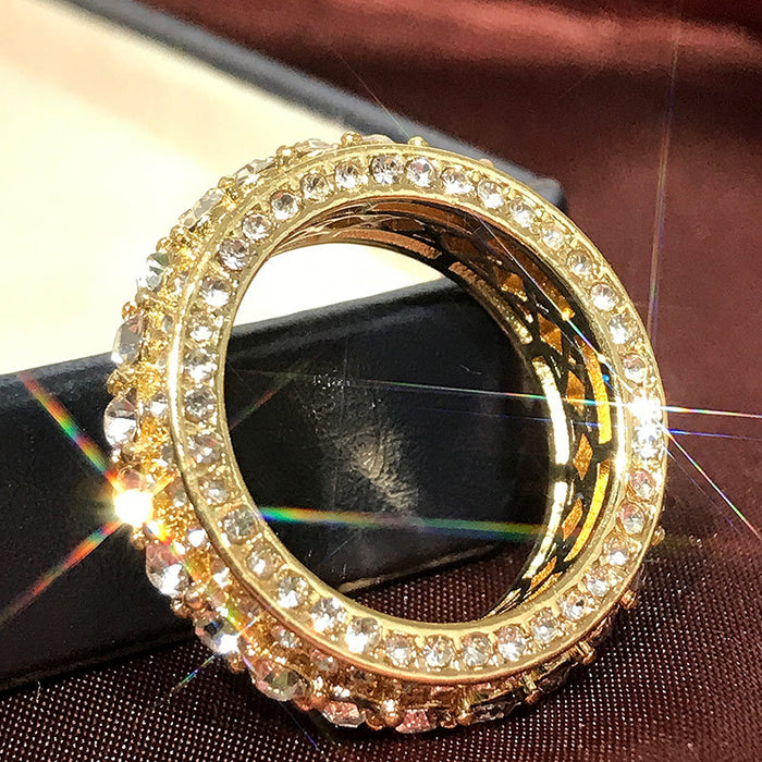 Anillo de aleación con diamantes redondos y creativo y elegante.