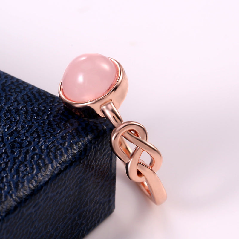 Anillo de dedo índice de mujer con piedra lunar de imitación rosa, diseño abierto de moda