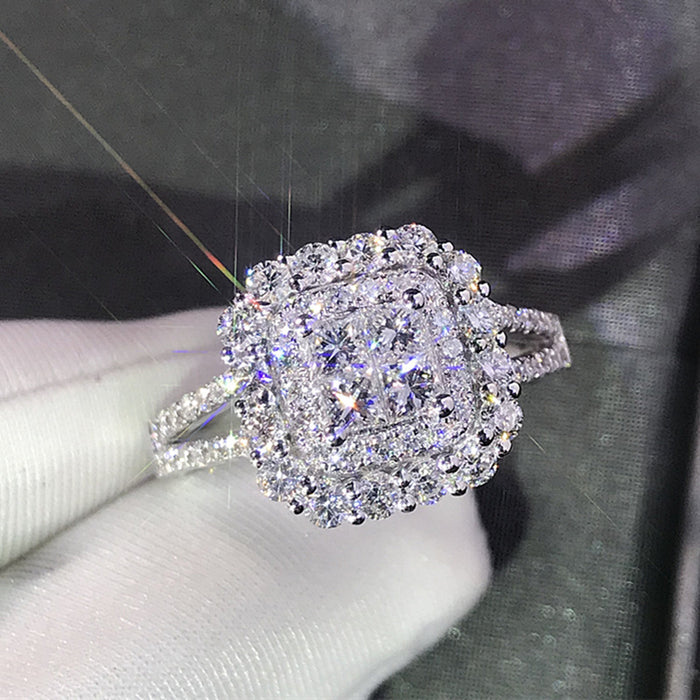 Anillo de bodas clásico para mujer con circonitas micropavé