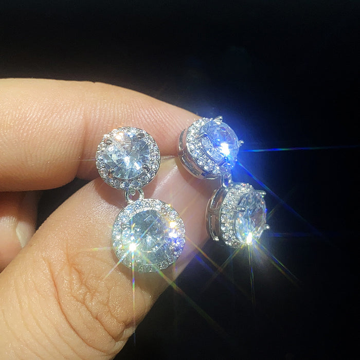 Exquisitos pendientes redondos de lujo para mujer con diamantes y circonitas.