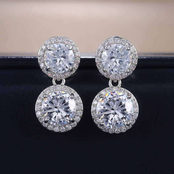 Exquisitos pendientes redondos de lujo para mujer con diamantes y circonitas.