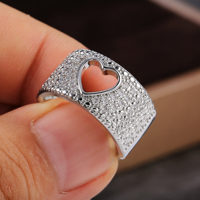 Anillo de cobre con circonitas incrustadas en forma de corazón hueco