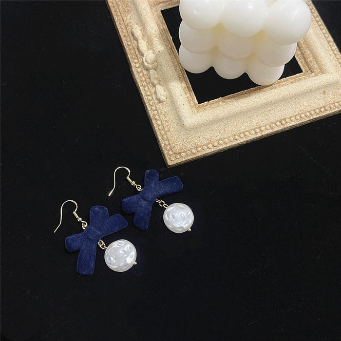 Pearl bow earrings S925 silver needle flocking retro all-match earrings