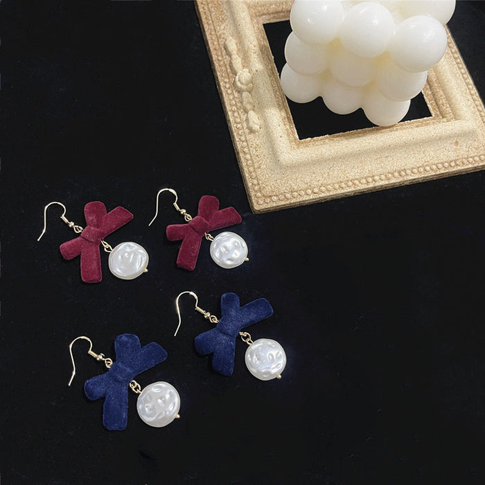 Pearl bow earrings S925 silver needle flocking retro all-match earrings