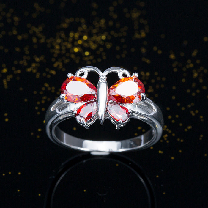 Anillo de corindón rojo con mariposa y circonita, joyería creativa plateada para mujer, venta al por mayor