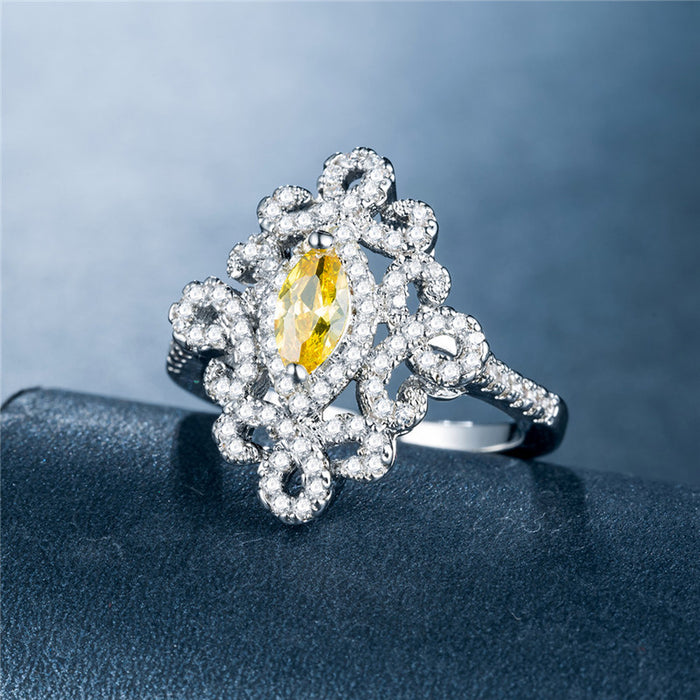 Anillo de lujo europeo y americano con circonita en forma de ojo de caballo para mujer, estilo enredadera de flores chapado en platino, joyería al por mayor