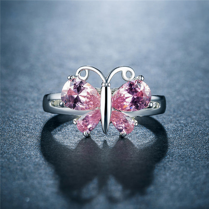 Anillo de corindón rojo con mariposa y circonita, joyería creativa plateada para mujer, venta al por mayor