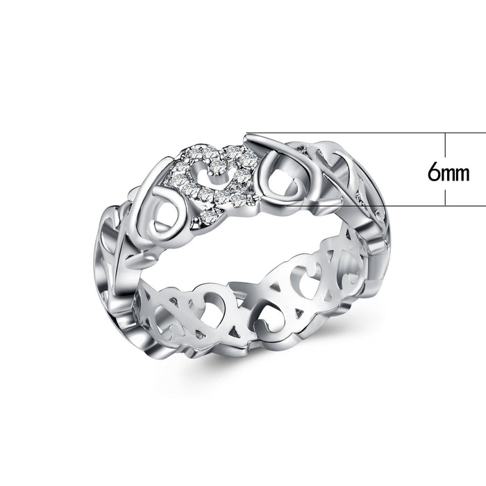 Anillo de bodas con forma de corazón y diamantes bañado en platino con circonitas para mujer