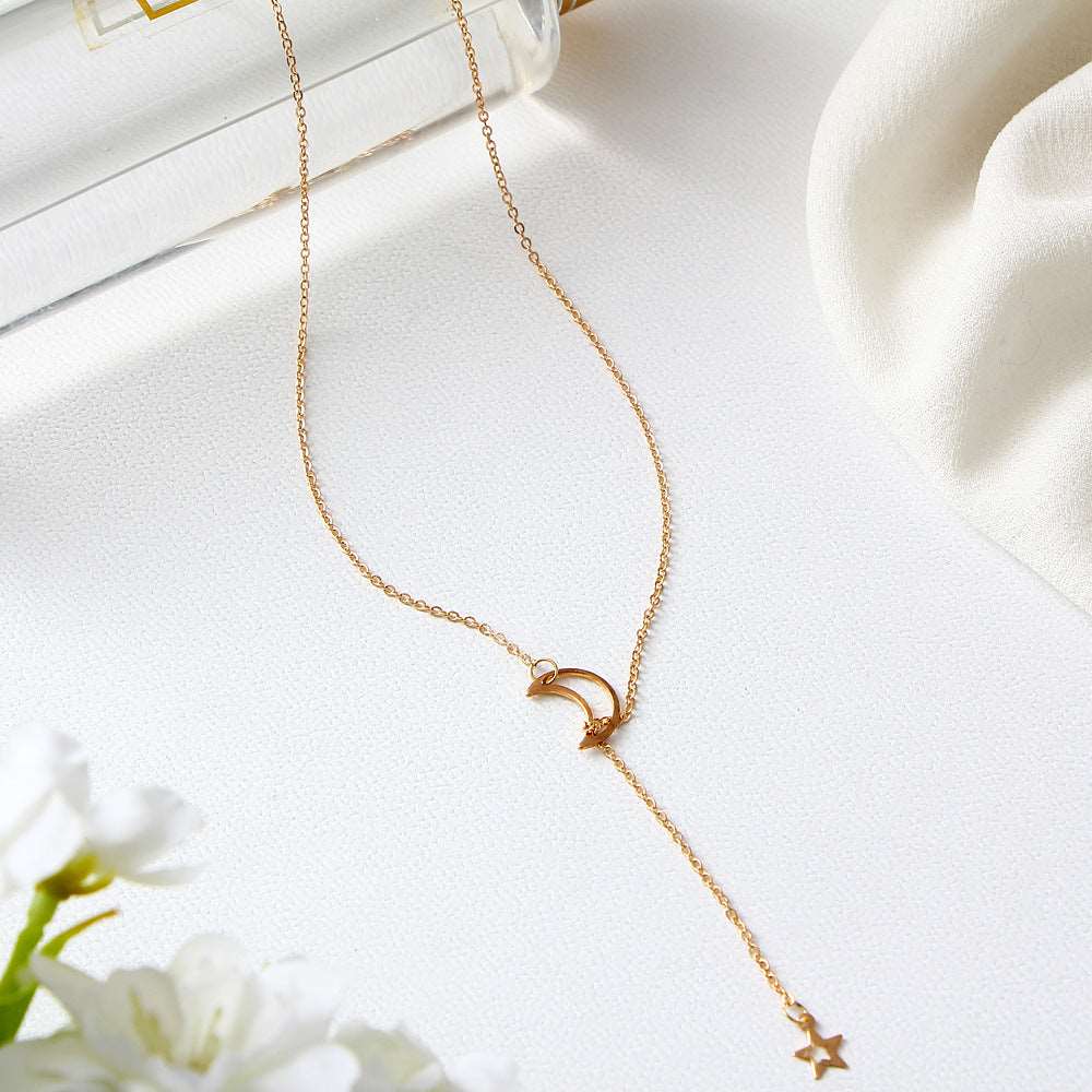 Gold and silver alloy moon and star necklace