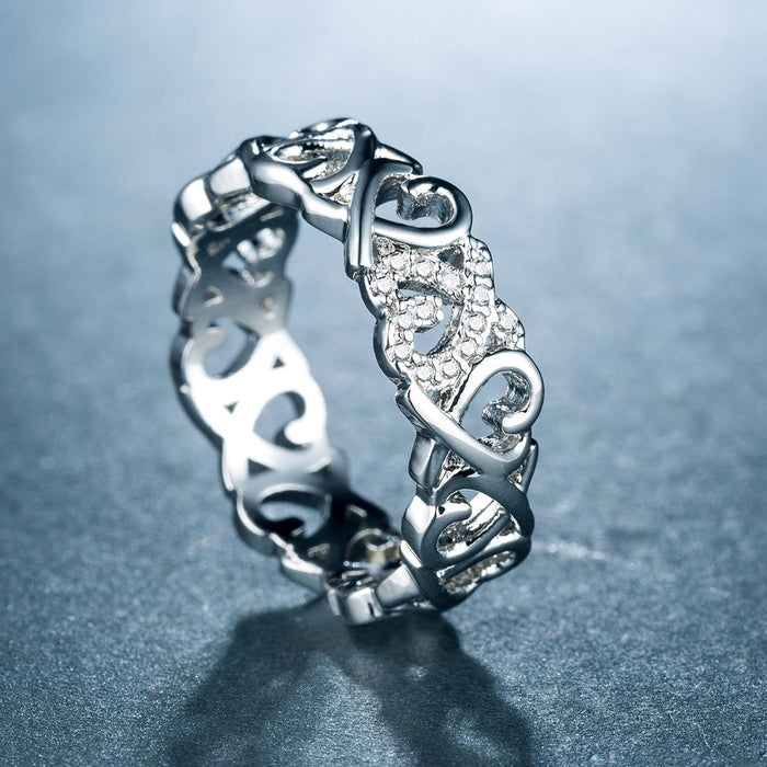 Anillo de bodas con forma de corazón y diamantes bañado en platino con circonitas para mujer