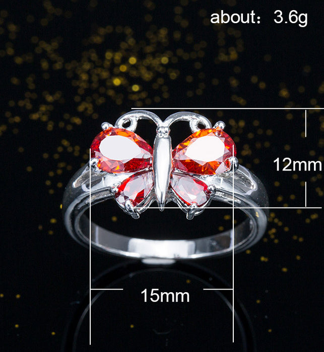 Anillo de corindón rojo con mariposa y circonita, joyería creativa plateada para mujer, venta al por mayor