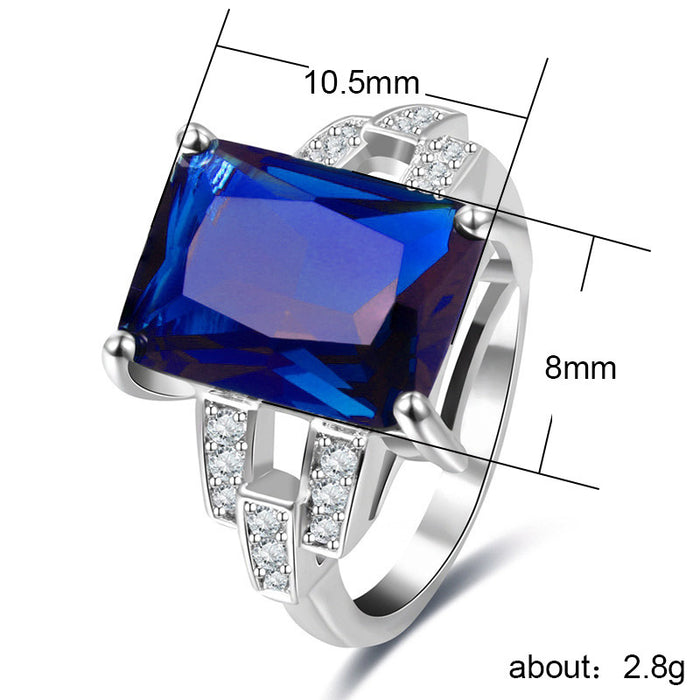 Anillo femenino sencillo con circonitas rectangulares azules