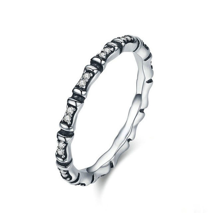 Anillo triple elegante y sencillo