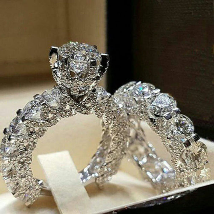 Juego de anillos de compromiso y boda con diamantes y circonitas para pareja