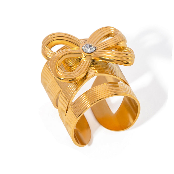 Stainless steel bow ring with diamonds