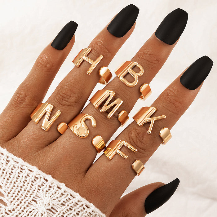 English letters simple gold 7-piece ring set