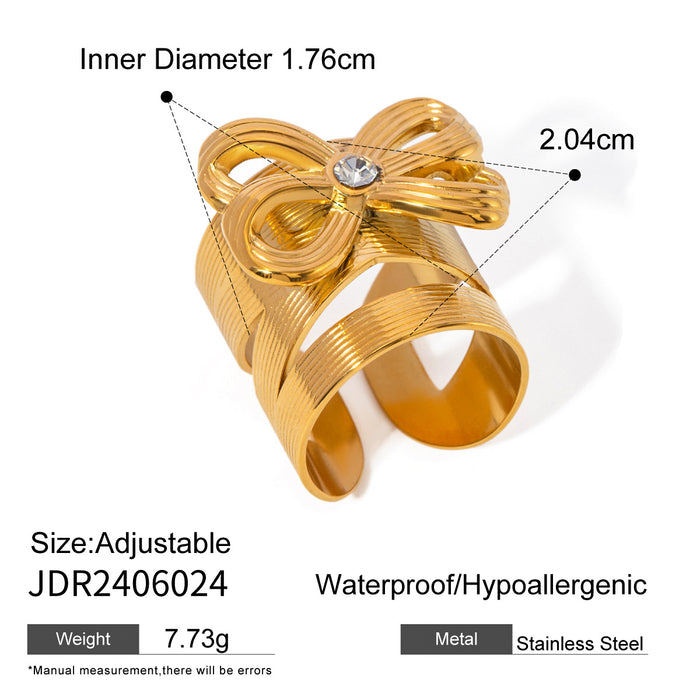 Stainless steel bow ring with diamonds