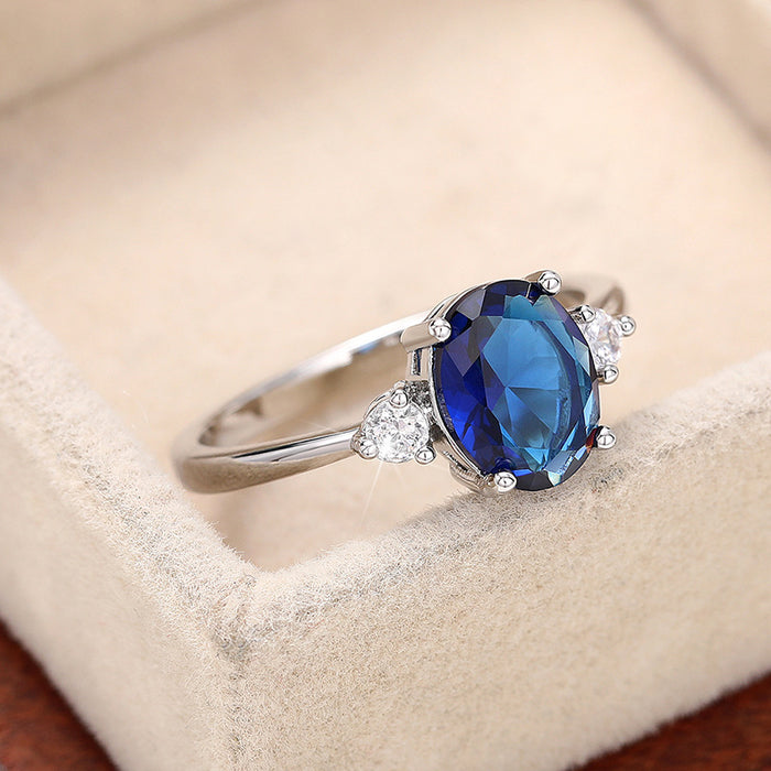 Anillo de piedra preciosa azul con forma de huevo con incrustaciones, joyería de temperamento noble