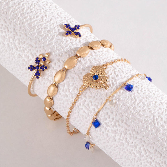 Conjunto de pulseras de flores con diamantes de imitación y dijes de gotas de agua: conjunto de cuatro piezas